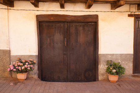 View of an old door of a Spanish houseの写真素材