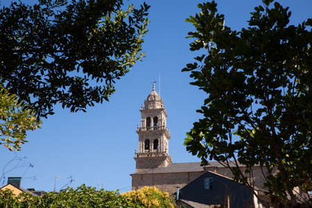 View of the belltower of the Basilica de La Encina in Ponferradaの写真素材
