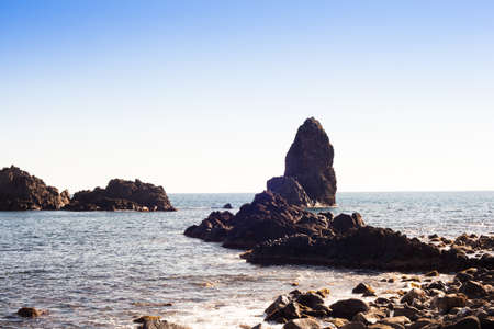 Famous the Islands of the Cyclops in Acitrezza in Sicily, Italy.の写真素材