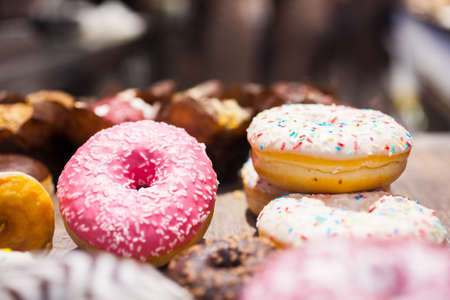 Traditional polish sweets doughnuts on the tableの写真素材