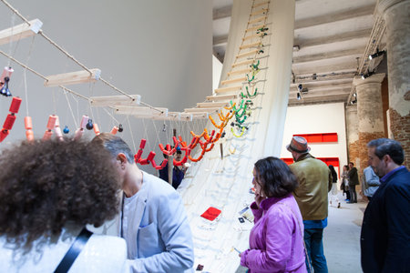 VENICE, ITALY - MAY, 10: Visitors interact with David Medallaâ€™s A Stitch in Time at the 57th...