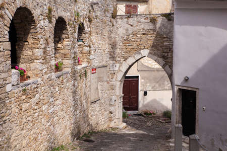 View of typical Motovun stone street and gate, Istria. Croatiaの写真素材