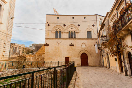 Magna Grecia ruins near Palazzo Montalto, also known as Palazzo Mergulese-Montalto, is a late 14th-century palace on the island of Ortygia in Syracuse, Sicilyの写真素材