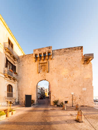 SIRACUSA, ITALY - DECEMBER, 31: View of the Porta Marina, ancient city door on December 31, 2017の写真素材