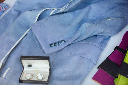 Close up of male suit in the clothes shopの写真素材