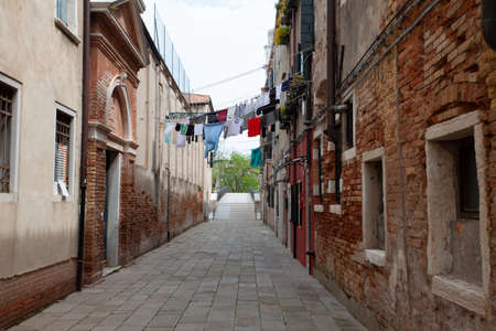 Clothes hanging to dry on a clothes-line in Veniceの写真素材