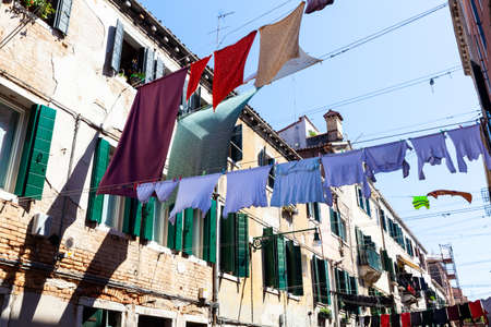 Clothes hanging to dry on a clothes-line in Veniceの写真素材
