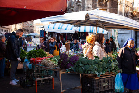 CATANIA, ITALY - DECEMBER, 17: View of vegetable stall in the traditional street market called Fera o Luni on December 17, 2019のeditorial素材