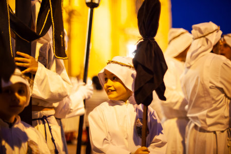 LEONFORTE, SICILY - APRIL, 19: Christian child brethren during the traditional Good Friday...