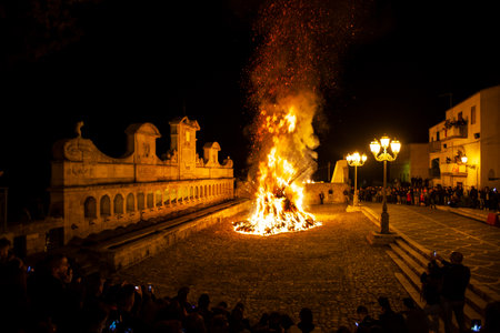 LEONFORTE, SICILY - APRIL, 19: Big fire next to the Granfonte fountain during the traditional Good Friday procession on April 19, 2019のeditorial素材