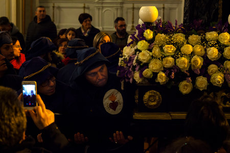 LEONFORTE, SICILY - APRIL, 19: Christian brethren during the traditional Good Friday procession on April 19, 2019のeditorial素材