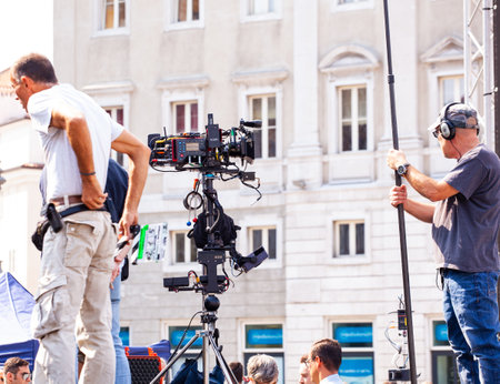 TRIESTE, ITALY - SEPTEMBER, 07: Behind the scene. Film crew team filming movie scene on outdoor location on September 07, 2016のeditorial素材