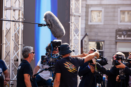 TRIESTE, ITALY - SEPTEMBER, 07: Behind the scene. Film crew team filming movie scene on outdoor location on September 07, 2016のeditorial素材