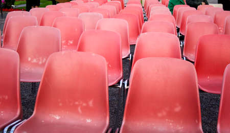 View of Red old plastic chairsの写真素材