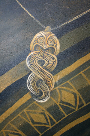 Milan, Italy - November, 08: Murals with a Pendant of a necklace painted on the wall on November 08, 2008のeditorial素材