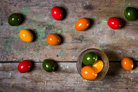 Colorful Easter eggs on wooden backgroundの写真素材