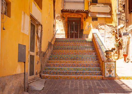 View of a staircase decorated with typical Sicilian ceramic tiles, Porto Empedocle. Sicilyの写真素材
