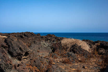 View of the lava beach of Linosa Called Mannarazza, Sicily. Italyの写真素材