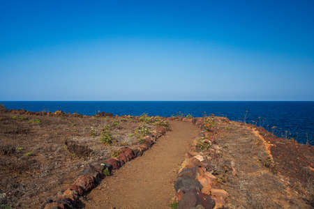 View of the path in the Linosa countryside, Sicilyの写真素材