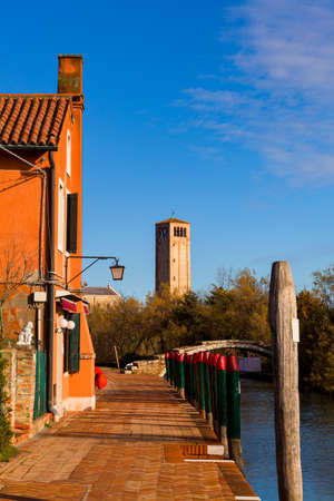 View of the Devil's Bridge and the bell tower on the island of Torcello, Venice. Italyの写真素材