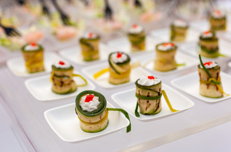 Close up of delicious Bite-Size Grilled Zucchini Roll-Up, an easy and tasty Italian appetizer