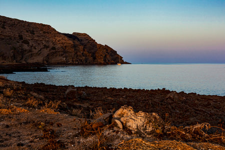 Typical beach with lava in the sea of Linosa one of the Pelagie Islands in the Sicily Channel of the Mediterranean Seaの写真素材
