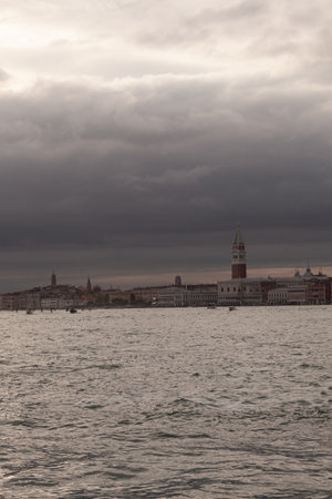 View of the St Mark's Campanile on the cloudy sky, Veniceの写真素材