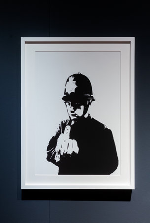Trieste, Italy - January 21, 2023: Screen print titled Rude Copper, by Banksy. The Great Communicator Banksy, Hall of Enchantmentsのeditorial素材