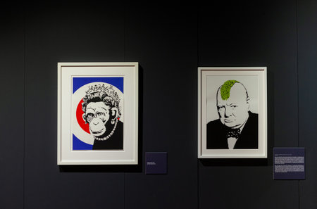 Trieste, Italy - January 21, 2023: Screen prints titled Winston Churchill May Day and Monkey Queen, by Banksy. The Great Communicator Banksy, Hall of Enchantmentsのeditorial素材