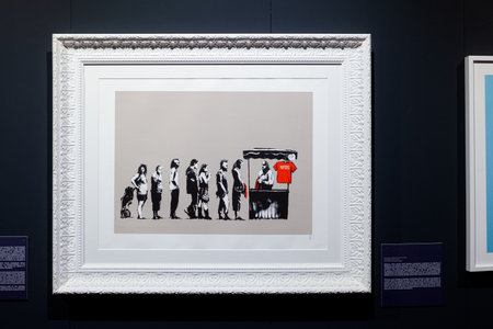 Trieste, Italy - January 21, 2023: Screen print from the set Barely Legal titled Sale Ends by Banksy. The Great Communicator Banksy, Hall of Enchantments. Courtesy Deodato Galleryのeditorial素材