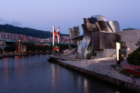 Bilbao, Spain - August 02, 2022: Sunset view of modern and contemporary art Guggenheim Museum and La Salve bridgeのeditorial素材