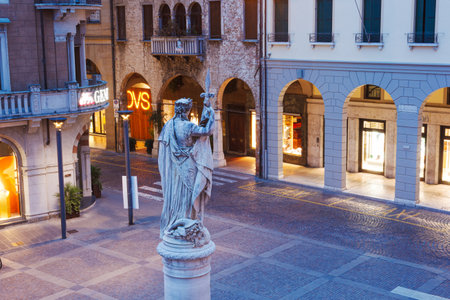 Treviso, Italy - July 24, 2023: Sunset view of the Teresona monument in the Independence Squareのeditorial素材