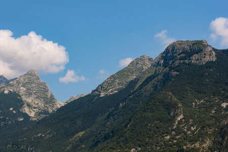 Scenic view of Julian Alps above the town of Bovec in northwestern Slovenia, near the Italian border.の写真素材
