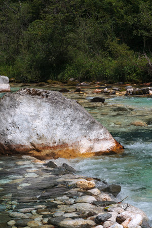 Boulders and stones in the river bed of the Soca river, Bovec, Slovenia, Europeの写真素材