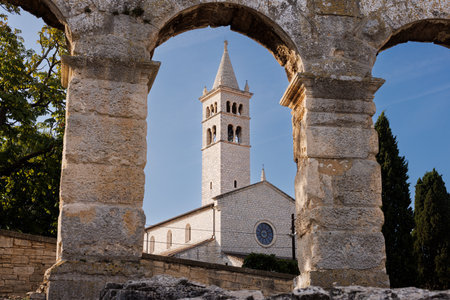 View of Catholic Church next to the Roman Amphitheater, Pula, Istria County, Croatia, Adriatic, Europeの写真素材