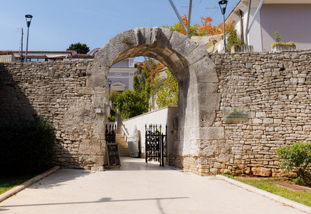 Pula, Croatia - August 22, 2024: Entrance arch in Pulaの写真素材