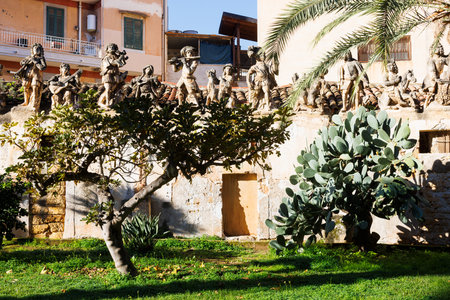 View of the garden in the Villa Palagonia, with the people and monster sculptures made of tuff which earned the nickname "The Villa of Monsters," 18th century, Bagheria, Sicily, Italyの写真素材