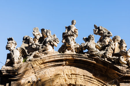 View of people and monster sculptures made of tuff in the Villa Palagonia, which earned the nickname "The Villa of Monsters," 18th century, Bagheria, Sicily, Italyの写真素材