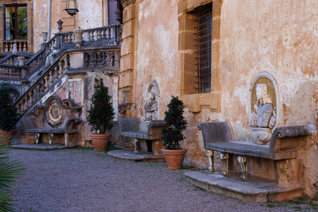 Stone bench of the The Villa Palagonia, nicknamed 'The Villa of Monsters,' is an 18th-century patrician villa in Bagheria, Sicily. It is one of the earliest examples of Sicilian Baroque architectureの写真素材