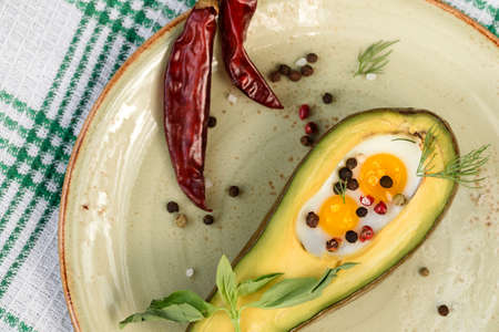 Eggs baked in avocadoの写真素材