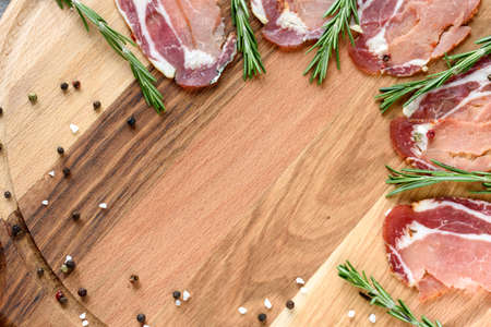 Spanish hamon ready for eat ovet the wooden backgroundの写真素材