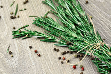 Rosmarin on gray wood.の写真素材