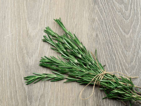 Rosmarin on gray wood.の写真素材