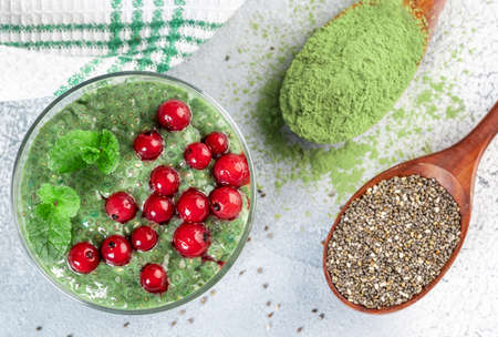 Homemade matcha green tea chia seed pudding, vegan dessert. Light backgroundの写真素材