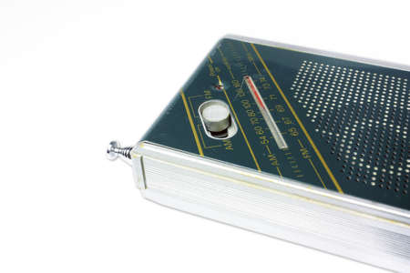 Old pocket radio isolated on white backgroundの写真素材