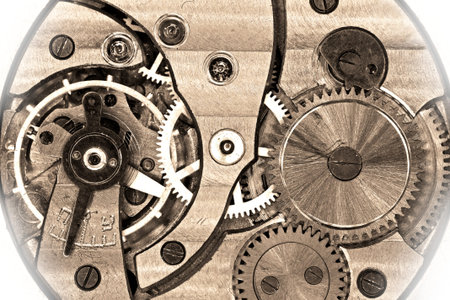 Old soviet pocket watch mechanism in sepia with white vignette