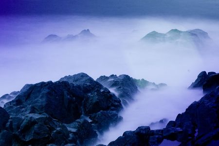 A long exposure with neutral density filters on a busy coastline.の写真素材