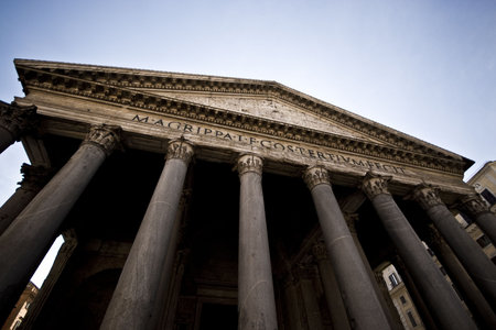 Looking up at the facade of the Pantheon in Rome.