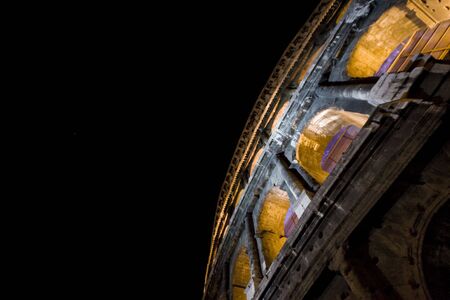 Photograph of the Roman Coliseum at night in Rome. の写真素材