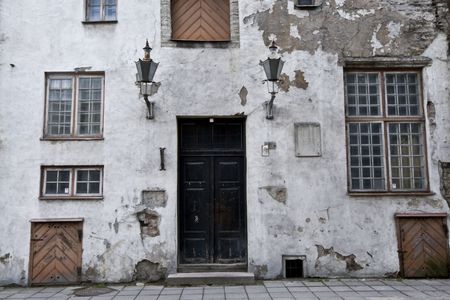 Run down, delapitated doorway and facade of a residential building in downtown Tallinn, Estonia. の写真素材